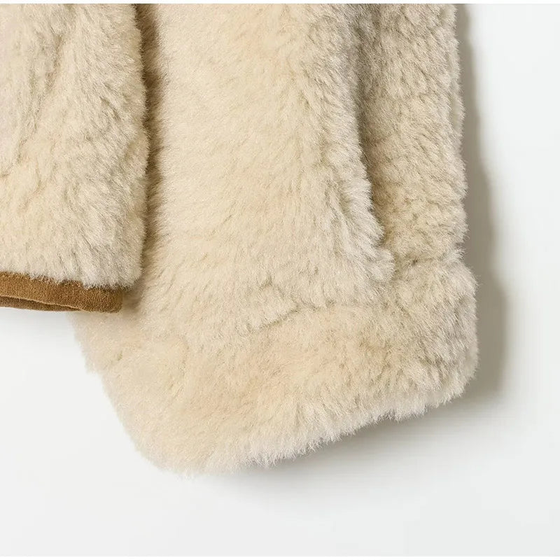 Veste réversible fausse suédine et fourrure