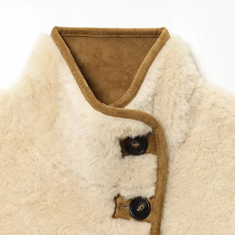 Veste réversible fausse suédine et fourrure